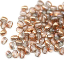 4x3mm Clear czech glass rice oval beads, copper coating - about 150pc