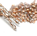 4x3mm Clear czech glass rice oval beads, copper coating - about 150pc