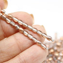 4x3mm Clear czech glass rice oval beads, copper coating - about 150pc