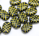 13x9mm Puffy oval black czech glass pressed beads, yellow wash, 15pc