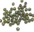 4mm Picasso green Czech glass fire polished round faceted spacers - 50Pc