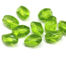 13x9mm Transparent green twisted czech glass barrel bead, 10Pc