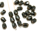 6x4mm Black rice czech glass fire polished beads golden ends, 25pc