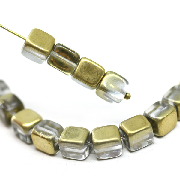 7x6mm Crystal clear cube czech glass, golden metallic finish 15pc