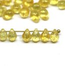 5x7mm Light yellow gold wash teardrops pressed czech glass beads