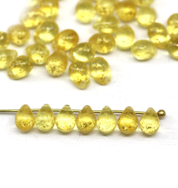 5x7mm Light yellow gold wash teardrops pressed czech glass beads