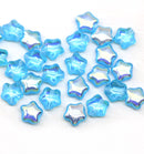 6mm Light Blue Czech glass star beads AB finish 25pc