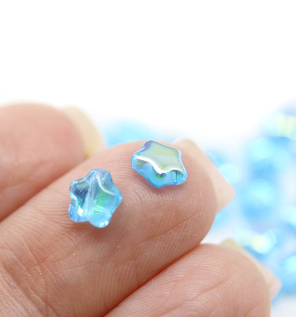 6mm Light Blue Czech glass star beads AB finish 25pc