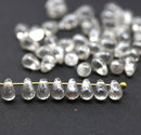 4x6mm Tiny clear teardrops silver wash Czech glass beads