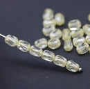6x4mm Pale yellow rice czech glass fire polished beads