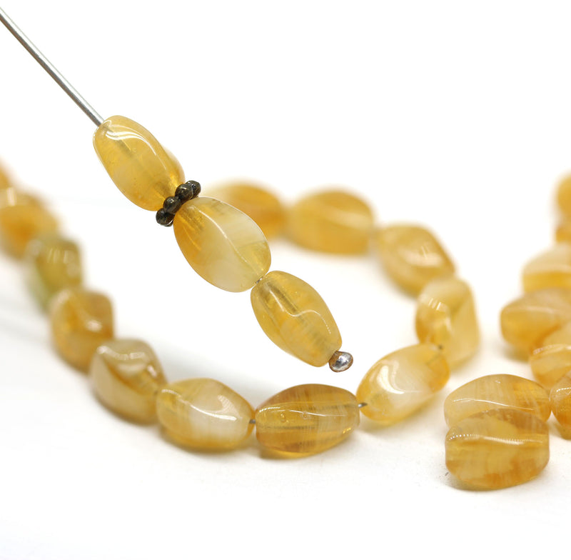 9x6mm Yellow amber mixed oval twisted oval glass beads, 30pc