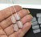 13x7mm Clear ornament rectangle pillows czech glass beads, 12pc