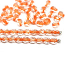 4mm Crystal clear czech glass beads, orange holes, fire polished - 50Pc