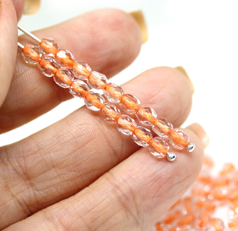 4mm Crystal clear czech glass beads, orange holes, fire polished - 50Pc