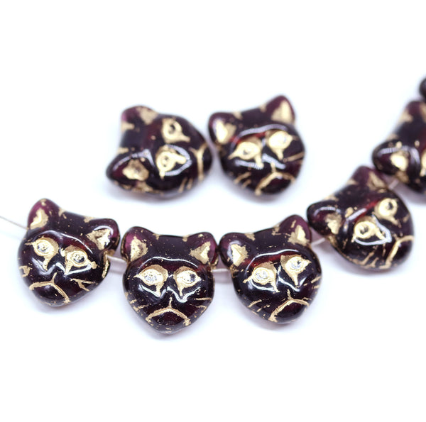 Dark purple cat head beads, golden inlays Czech glass feline beads