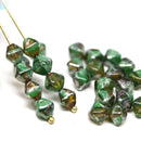 6mm Mixed clear green bicone beads with travertin finish Czech glass