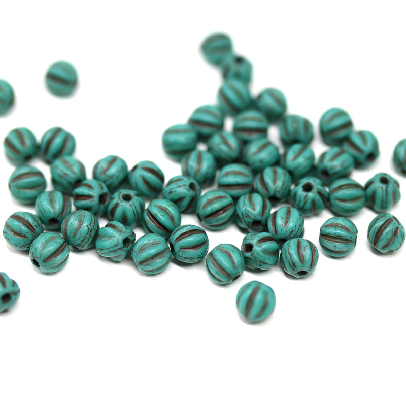 4mm Dark turquoise green melon shape glass beads with black stripes