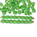 4mm Green czech glass fire polished beads, gold wash holes - 50Pc