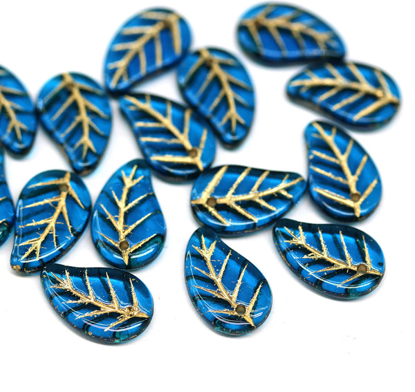 14x9mm Capri blue Czech glass leaves, gold wash, 15pc