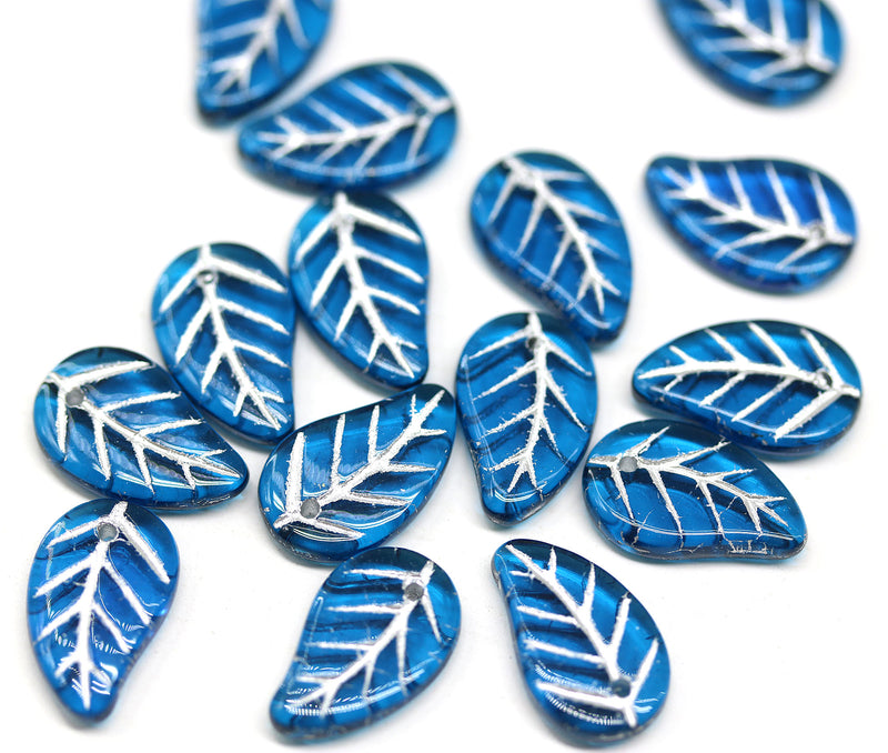 14x9mm Capri blue Czech glass leaves, silver wash, 15pc