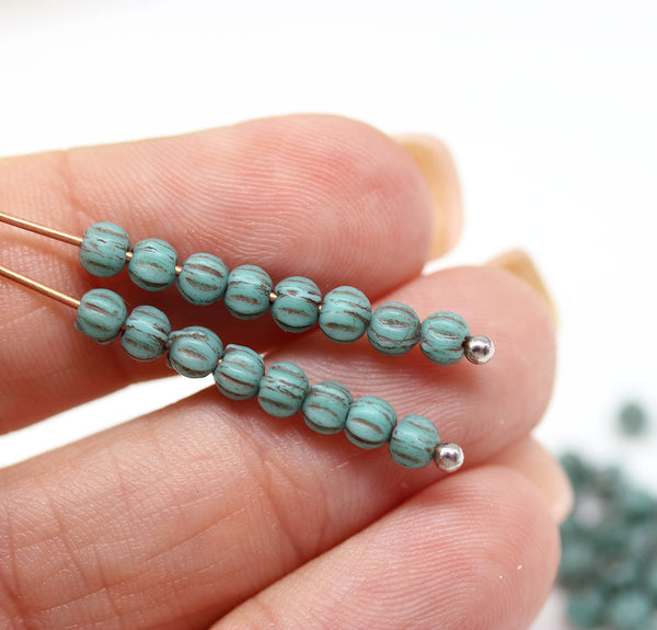 3mm Frosted turquoise melon shape glass beads, black stripes, 4gr