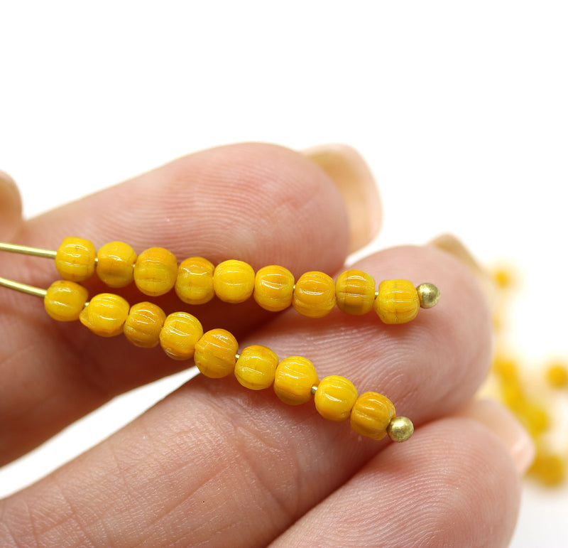 3mm Ocher yellow melon shape glass beads, 4gr