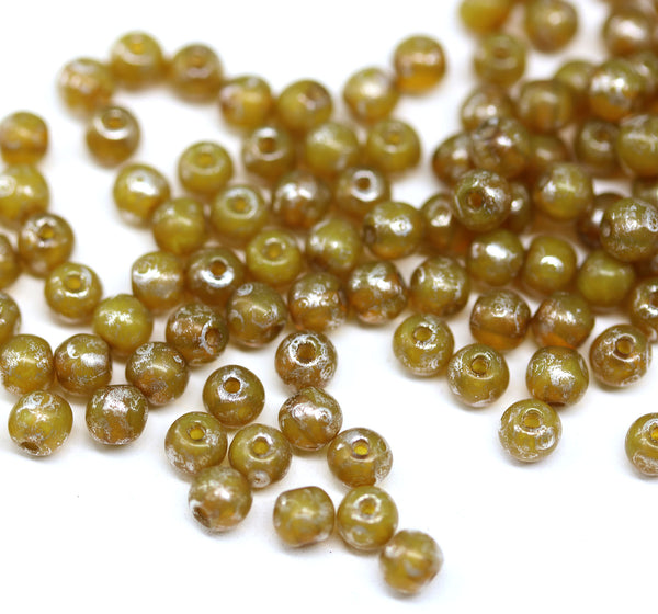 4mm Opal yellow Czech glass round druk spacers silver wash, approx.90Pc