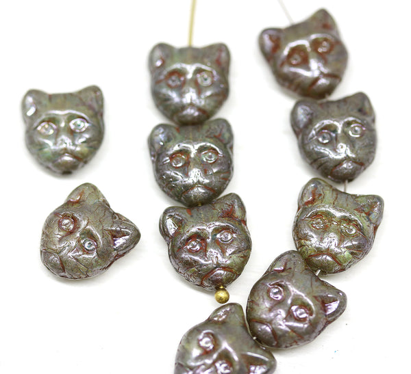 10pc Picasso cat head beads, green Czech glass feline beads