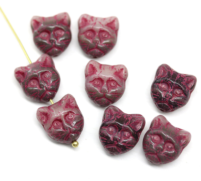 10pc Brown cat head beads with rustic red wash