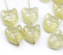 Light yellow cat head beads with silver wash