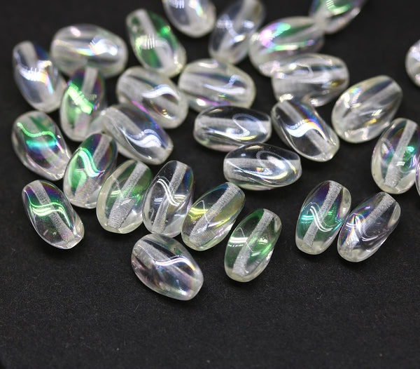 9x6mm Crystal clear lustered twisted oval czech glass beads, AB finish, 30pc