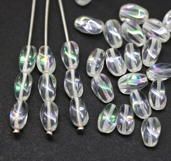 9x6mm Crystal clear lustered twisted oval czech glass beads, AB finish, 30pc