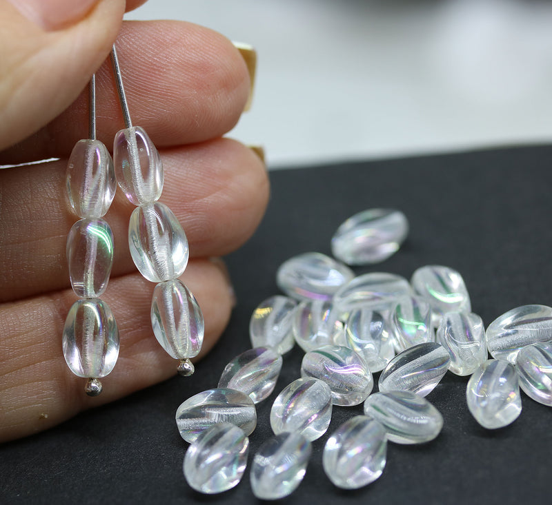 9x6mm Crystal clear lustered twisted oval czech glass beads, AB finish, 30pc