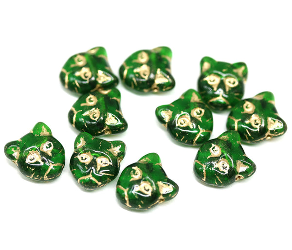Emerald green cat head beads, golden inlays Czech glass feline beads