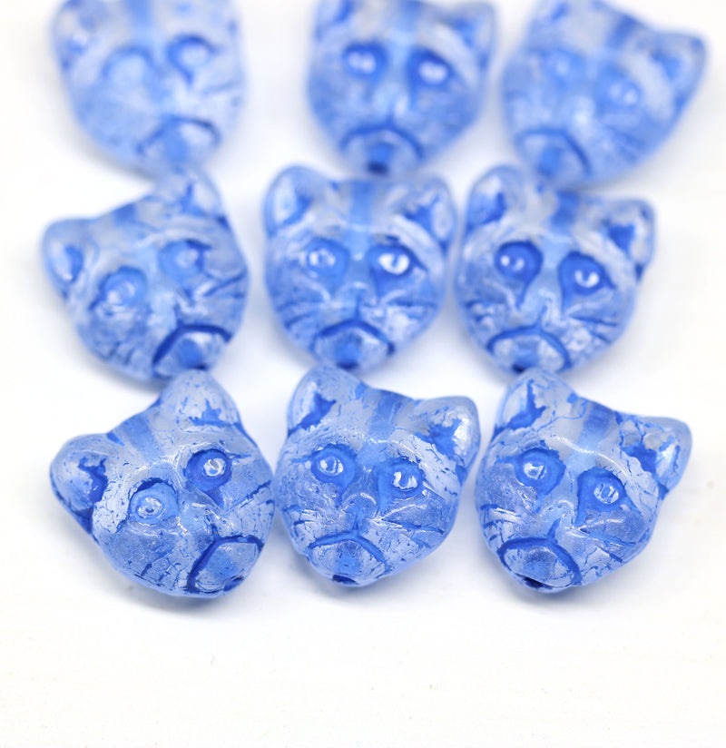 10pc Crystal clear cat head Czech glass beads blue inlays