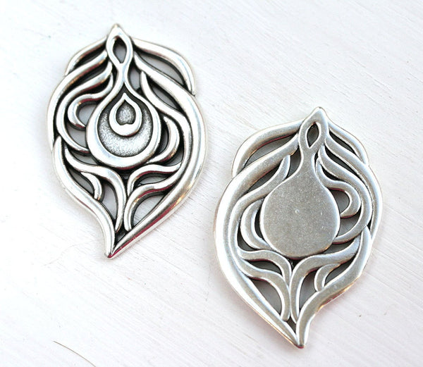 Antique silver peacock feather pendant