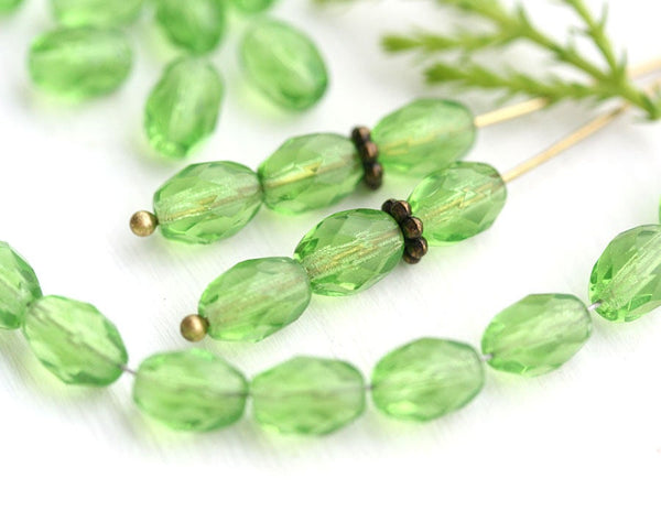 8x6mm Transparent Green barrel beads, czech glass fire polished - 30Pc