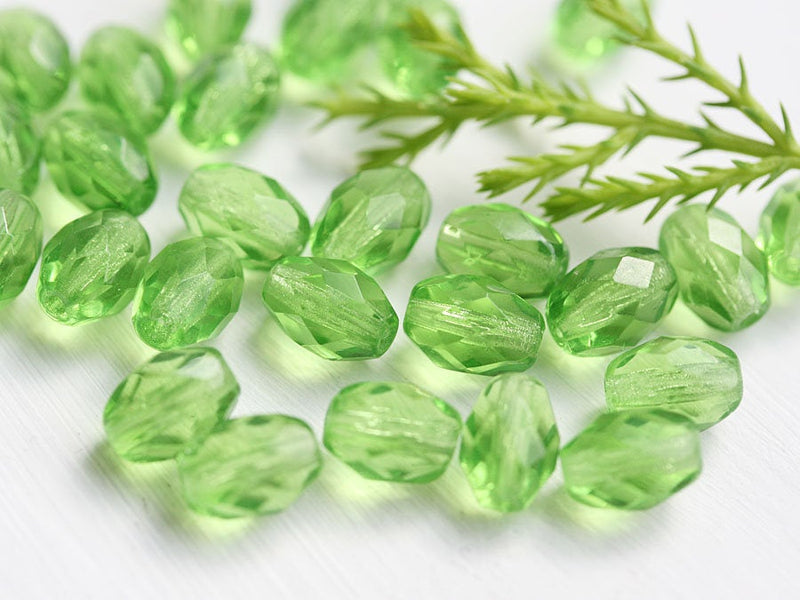 8x6mm Transparent Green barrel beads, czech glass fire polished - 30Pc