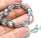 9x6mm Montana Blue oval twisted oval glass beads, 30pc