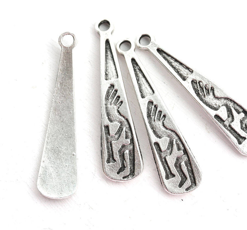 4pc Antique Silver Kokopelli charm beads