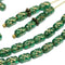 6x4mm Green czech glass rice beads Golden stars ornament small oval beads - 50pc