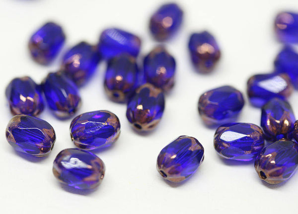 6x4mm Dark Blue rice czech glass fire polished beads Copper luster ends 25pc