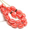9x6mm Coral Red oval Czech glass pressed barrel with luster rice beads 30pc