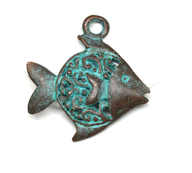 Filigree ornament Fish pendant Green patina copper