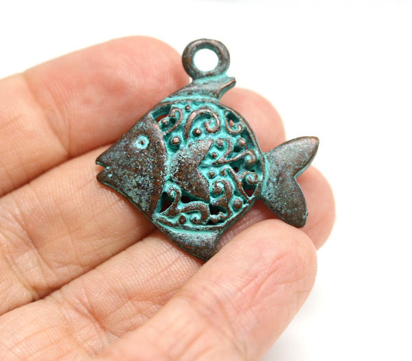 Filigree ornament Fish pendant Green patina copper