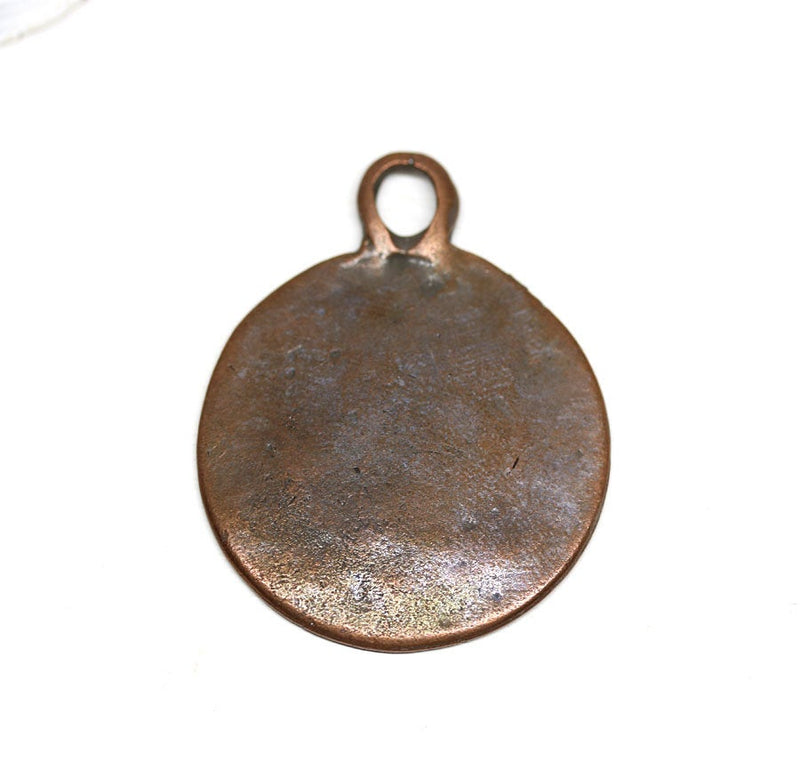 Ancient Symbols round copper pendant