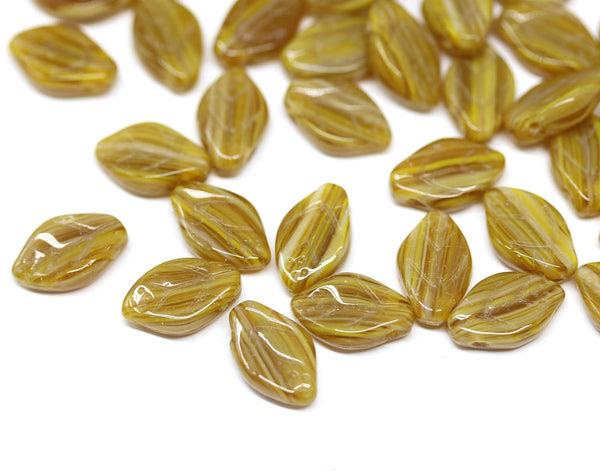 12x7mm Ocher yellow leaf beads, Czech glass pressed top drilled - 50pc