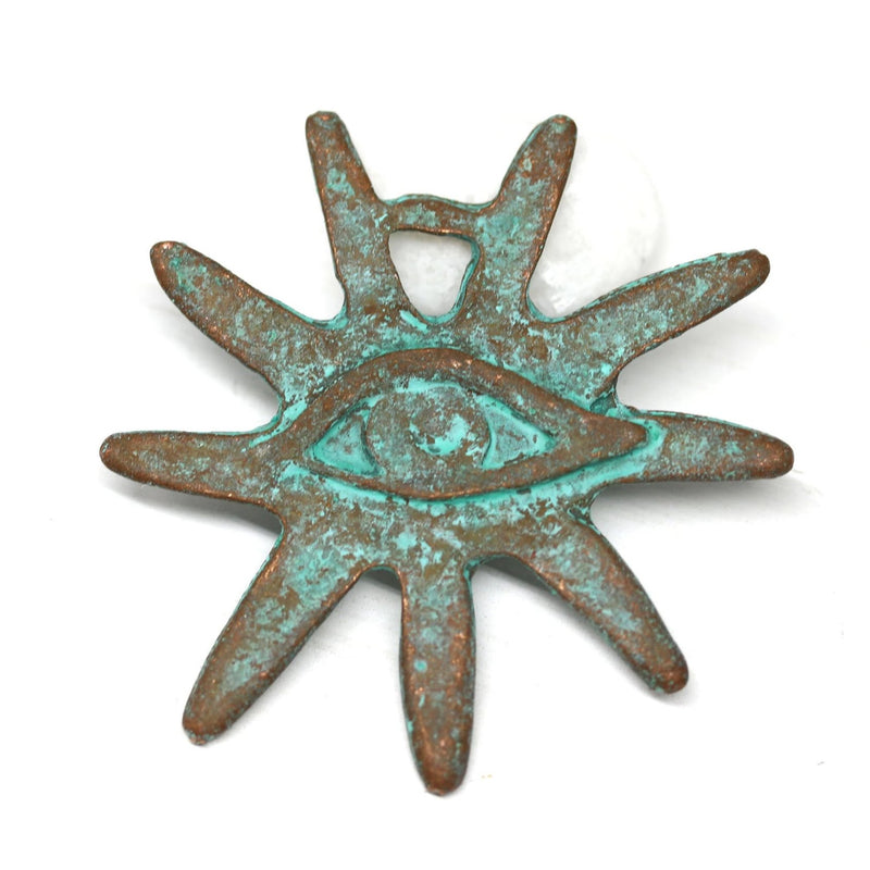Sun rays ethnic pendant, Green patina Evil eye symbol