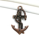 Antique copper large anchor pendant with crucified Jesus