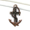 Antique copper large anchor pendant with crucified Jesus